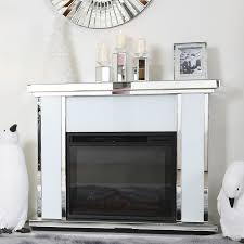 Application in all kinds of interiors according to taste a very attractive electric fireplace surround that will make your room cozier and more soothing. Madison White Mirrored Electric Fireplace Surround Picture Perfect Home