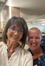 Sister Dianne McFall meeting president Kimball during his visit for temple  deductions and mission conferences. She is the current sister Swain.