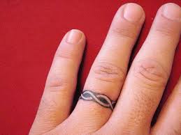 Celebs Who Got Overweight Wedding Band Tattoo Tattoo Wedding Rings Ring Tattoo Designs