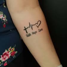 There is a balloon with a date and a picture of a child. Top 91 Faith Hope Love Tattoo Ideas 2021 Inspiration Guide