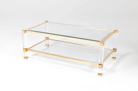 This solid, heavy and gleaming lucite coffee table is absolutely stunning and perfect for any decor. Lucite And Brass Coffee Table Hire Rental Granger Hertzog