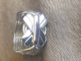 It measures 11 mm (0.43) on the face. 9 Band Puzzle Ring For Men