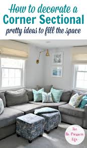 How To Decorate Above A Corner Sectional Sofa 3 Simple Pretty Ideas Corner Sectional Sofa Sectional Living Room Layout Corner Sectional