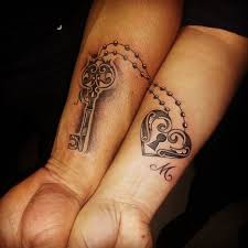 Once again we see a beautiful lock and key tattoo art where the lock is leading the key and amongst the soft designs that define and bind them together, a pink satin bow can be seen wrapped around the lock which can be a possible meaning of a newly formed love with the words respect 'etched' on the down low. 45 Matching Lock And Key Tattoo Designs And Ideas For Couples