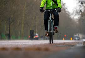 Image result for rain cyclist