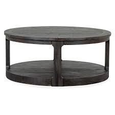 Round shapes can tuck easily into a sectional's corner, while rectangular tables can set boundaries within a room. Boswell Round Cocktail Table W Casters By Magnussen Home Nis479975989 Sylvan Furniture