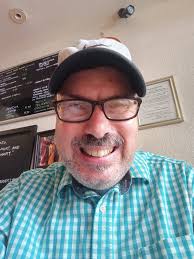 Joanie Putnam sitting at the counter of Joanie's Cafe, which was previously  Fat Boys, and Wild Horse Charlie's before that. Photo provided by Nanette  Hayden Lujan.