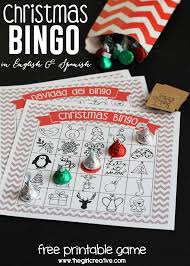 Bingo Holiday Free Bingo Games Printable Christmas Bingo Game In English And Spanish The Girl Creative Christmas Bingo School Christmas Party Christmas Party Games