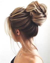 ( this is a real bun not a floppy messy bun) stylist: Messy High Bun Min Ecemella