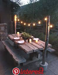 20 Diy Ideas For Outdoor Dining Spaces Page 14 Of 22 Draped Lights Over An Old Wood Ta Backyard Deck Ideas On A Budget Backyard Decor Outdoor Dining Spaces
