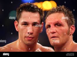 27-year-old Middleweight boxer Felix Sturm (L) and his defeated opponent Gavin  Topp pose after the boxing fight in the Estrel Hotel in Berlin, Germany,  Saturday, 02 December 2006. After the loss of
