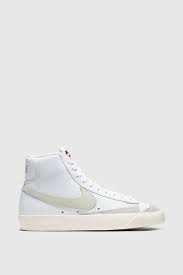They were designed to compete with converse and adidas sneakers that were dominating the court, and feature a simple. Wood Wood Nike Blazer Mid 77