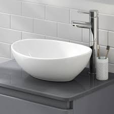 The stone wash basin sink is polished to perfection, the modern wash basins is essentially non corrosive, it is easy to remove stains because the material is repairable and renewable. Lexonelec Countertop Basin Bathroom Wash Basin Oval Round Bowl Top Ceramic Basin Sink Modern Design Oval Round Buy Online In El Salvador At Elsalvador Desertcart Com Productid 75386255
