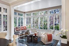 This kitchen features a column for support after an existing wall would be removed. Beautiful Sunroom Addition Off The Kitchen With Hardwood Floors Bright Windows And Wanes Coting Ceiling Coa Sunroom Designs Sunroom Decorating Indoor Sunrooms