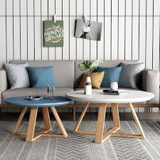 Here's an example of a living room with a coffee table so large it's verging on being the size of a ping pong table. Nordic Small Coffee Table Simple Living Room Round Table Apartment Sofa Triangle Side Solid Wood Simple No Formaldehyde Shopee Malaysia