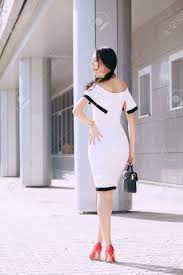 This type of therapy looks into the interaction between the conscious and unconscious mind. Young Beautiful Stylish Girl In White Dress And Black Bag Walk And Pose Outdoors Fashion Style Shopping The Concept Of Women S Fashion Urban Lifestyle Stock Photo Picture And Royalty Free Image Image