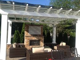 Some popular features for outdoor fireplaces are electronic ignition, venting required and portable. Wood Burning Or Gas Outdoor Fireplace For Your Dix Hills Ny Backyard Gary Duff Designs