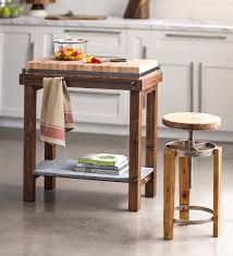 Instead of shuttling plates back and forth from dining room to kitchen, it's a simple matter to slide them right on over to the diner—just a few feet away. Reclaimed Wood Butcher Block Island Vivaterra