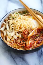 Once the soup base is boiling, add ramen and shiitake mushrooms. Kimchi Ramen Rasa Malaysia