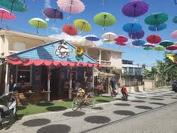 Cafe colao in the heart jarabacoa with umbrella decoration hung over the street outside. Cafe Colao Picture Of Cafe Colao Jarabacoa Tripadvisor