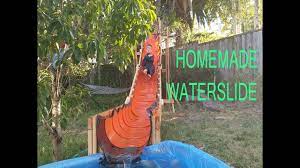 We taped the top layer seams of the plywood to keep things from slipping around. Homemade Water Slide 21ft For 200 Youtube