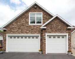 The header itself should be nine inches wider than the door. Exterior Door Surrounds Mid America