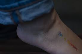 Beside the tattoo are three roses, another ink art that might also be a tribute to hennessy. The Vermont Cynic Students And Their Ink The Stories Behind Student Tattoos