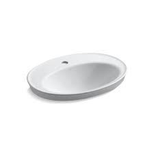 This sink has a drain. Kohler Serif Drop In Bathroom Sink With Single Faucet Hole 16 In White 2075 1 0 Rona