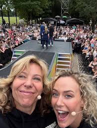 What are some fun ways to experience country music at "May We All"?