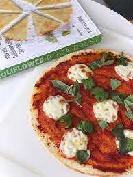 There is only one crust per box. At 80 Calories Per Serving Trader Joe S Cauliflower Pizza Crust Is The Only Crust We Re Eating Cauliflower Crust Pizza Cauliflower Pizza Crust Recipe Cauliflower Pizza