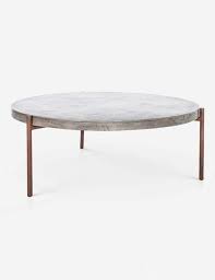 It can be folded away when not in use. Harrison Indoor Outdoor Round Coffee Table