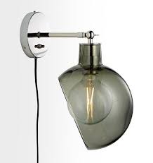 You can even hide their cords from view with cable concealers — or not! Edendale Angled Articulating Plug In Sconce Smoke Glass Plug In Sconce Sconces Smoked Glass