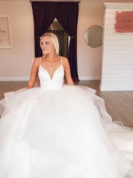 Brides Love The Clean But Dramatic Look Of The Tatum Dress By L Amour It S The Perfect Ballgown For A Princess Book An Appo Bridal Dresses Bridal Boutique