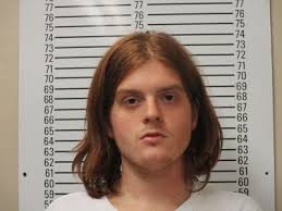 Law enforcement says man behind bars, accused of threatening elected  officials