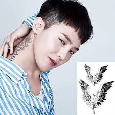G dragon's tattoos that you can filter by style, body part and size, and order by date or score. G Dragon Angel Wings Tattoo Temporary Tattoo Tattoosticker Sticker Tattoo Temporarytattoo Tattoosticker Sticker Tattoo ãƒœãƒ‡ã‚£ãƒ¼ã‚¢ãƒ¼ãƒˆ ã‚¿ãƒˆã‚¥ãƒ¼ã‚¢ãƒ¼ãƒˆ ã‚¿ãƒˆã‚¥ãƒ¼