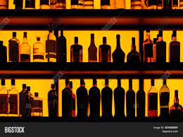 Bar shelves backlit with colour change led lighting. Rows Bottles Sitting Image Photo Free Trial Bigstock