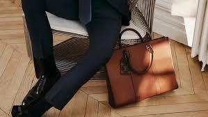 Its products include leather goods, handbags, trunks, shoes, watches, jewelry and accessories. Louis Vuitton S New Formals Puts A Spin On Business Accessories Robb Report