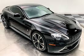 Image result for Jet Black 2011 Aston Martin