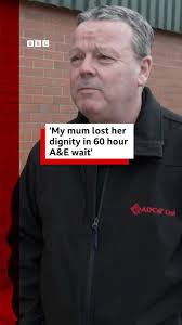 The son of an 88-year-old woman who has been stuck in A&E for more than 60  hours said she had been stripped of her dignity. Maureen Harman was taken  to Wigan Infirmary