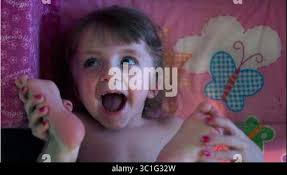 Apr 06, 2006; International Falls, MN, USA; (Left to right) Stacey Moss  helps her daughter, five-year-old Hope Moss, balance