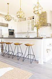 45 Medal Worthy Ways To Decorate With Gold Silver And Bronze Hgtv Kitchen Design Decor Home Decor Kitchen Island With Seating