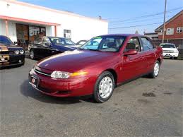 Image result for Bright Red 2000 Saturn