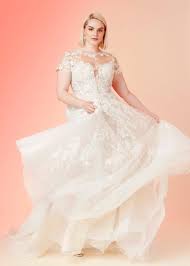 12 Of The Best Plus Size Wedding Gowns You Can Buy Right Now Including 4 Under 300 Wedding Dress Bustle Wedding Dress Cap Sleeves Plus Size Wedding Gowns