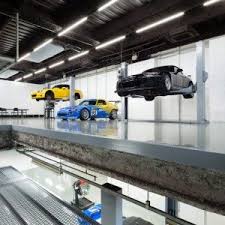 Japanese Firm Torafu Architects Renovated This Auto Repair Shop In Tokyo To Make It Look As Sleek As A Car Showro Auto Repair Shop Car Workshop Garage Redesign