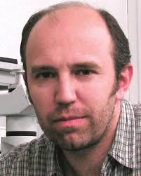 Collective motion of cells: from experiments to models