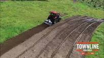 Case IH Maxxum with a FAE STC stone crusher