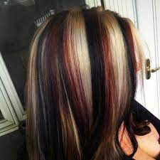 The following red and black hair color ideas are just a tip of the iceberg when it comes to what one can these days accomplish using hair care products now in the salon or on the market. Image Result For Blonde Red Brown Violet Pinwheel Hair Pinwheel Hair Color Trendy Hair Color Pinwheel Hair