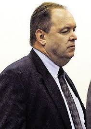 Judge tosses firearms charge against state police lieutenant