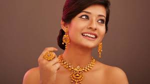 Gold trades near record high as Fed expected to cut rates