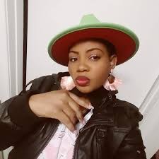 Blingbabezboutique Ceo Showing You Can Still Wear Your Scrub And Look Fantastic Here Im Modeling My Green Fedora Hat Line With Red Inside Also Flaunting My Beautiful Peach And Gold Tassle